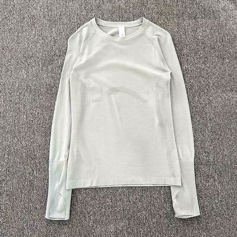 Haut de vêtements de Yoga pour femmes au printemps et en automne, coupe slim, manches longues, cours