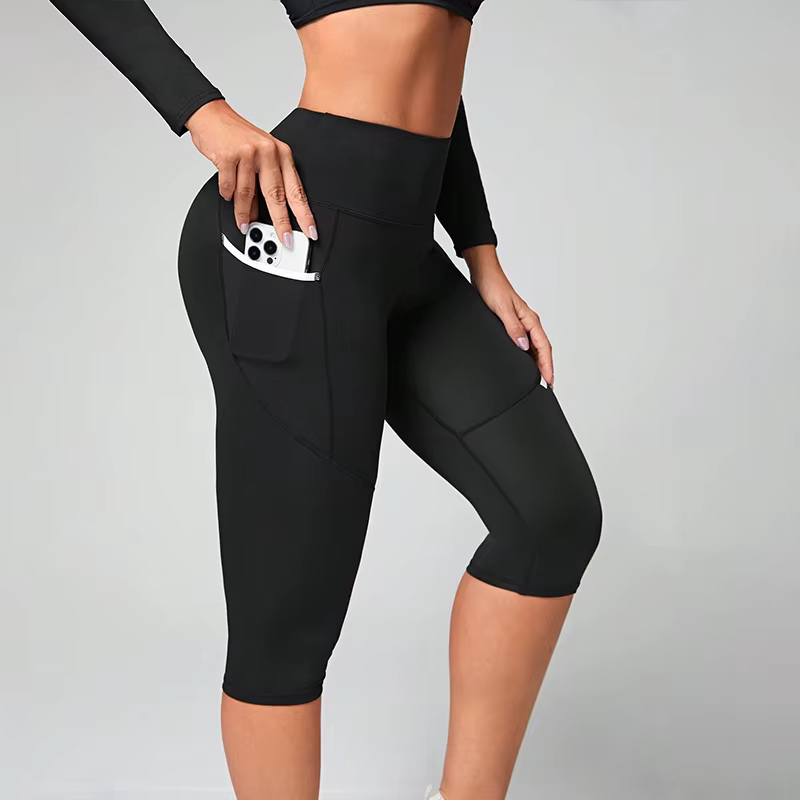 Pantalons de yoga taille haute Leggings capri avec poches pour femmes Leggings capri d'entraînement