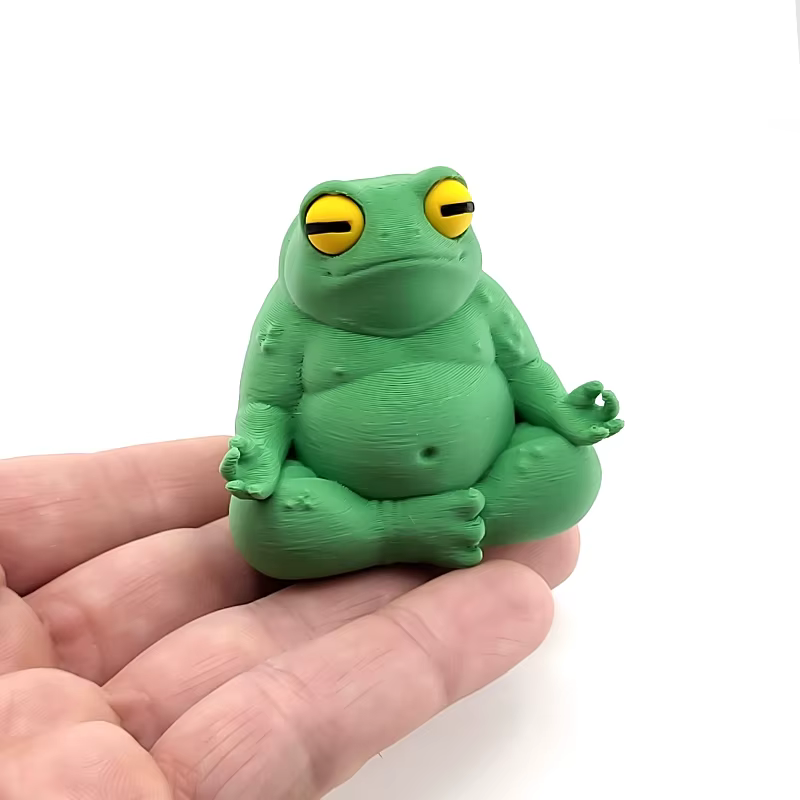 Figurine de grenouille méditative mignonne