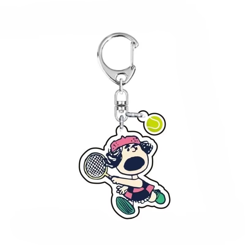 Porte-clés pendentif Snoopy chiot mignon de dessin animé jouant au tennis, en acrylique, pour clés de voiture et sacs, accessoire de personnalité tendance, vente en gros