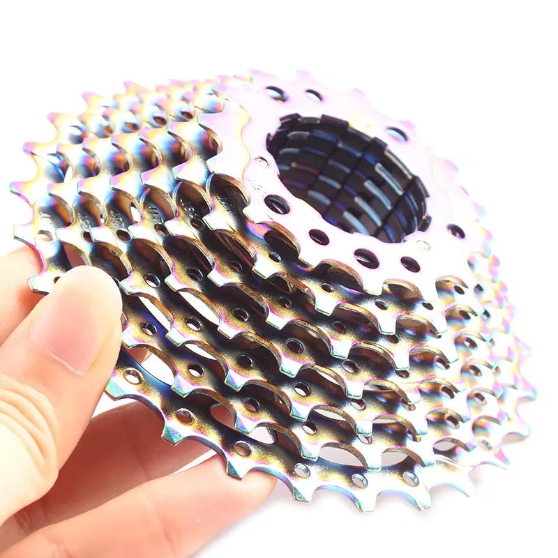 Vélo de route 9 10 vitesses 11-28T Cassette arc-en-ciel CNC vélo de gravier roue libre 9s 10s pignon coloré ultraléger K7 11V volant d'inertie