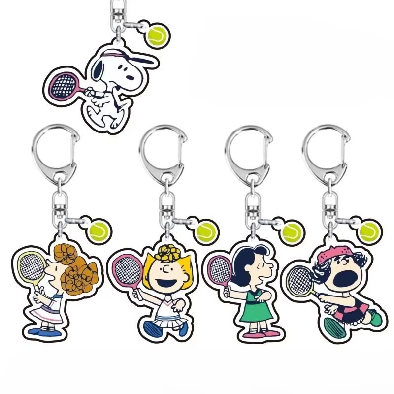 Porte-clés pendentif Snoopy chiot mignon de dessin animé jouant au tennis, en acrylique, pour clés de voiture et sacs, accessoire de personnalité tendance, vente en gros