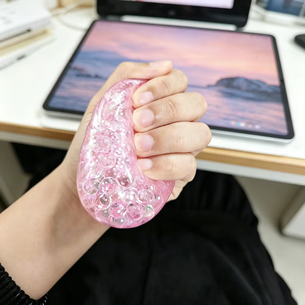 Jouet anti-stress en forme de bao bao vapeur avec perles et paillettes, jouet sensoriel souple et moelleux pour la décompression