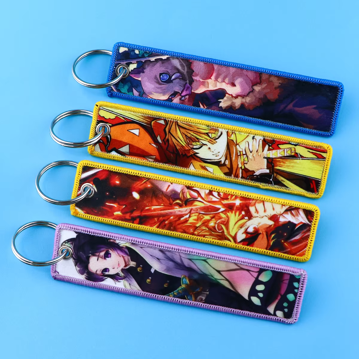 Porte-clés de personnages d'anime classique, porte-clés de broderie de manga, porte-clés pour voiture, accessoires de cosplay de Hurcycles, cadeaux de jouets
