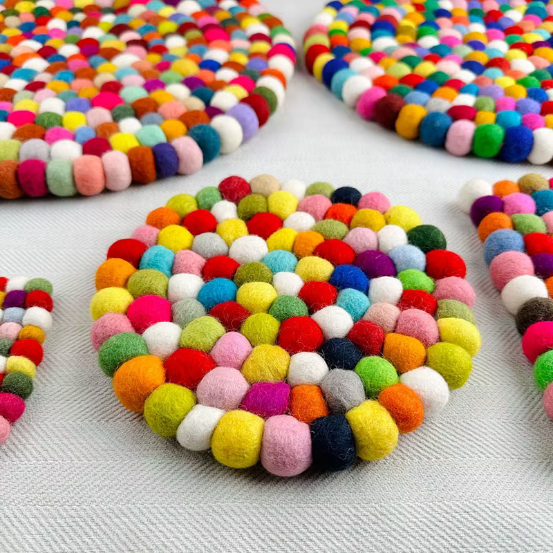 Tapis de bol chantant en feutre de laine