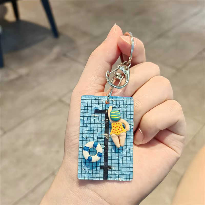 Porte-clés en acrylique Fille nageuse, Pendentif figurine bouée de natation, Accessoire décoratif pour sac à dos ou sac, Idéal comme cadeau de vacances